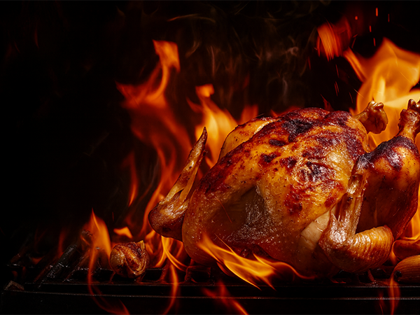 Pollo arrosto in forno a legna